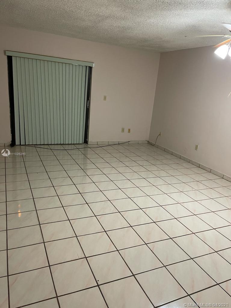 5900 West 18th Avenue, Unit A14 Hialeah, FL 33012 - Photo 16 of 29 a view of a garage