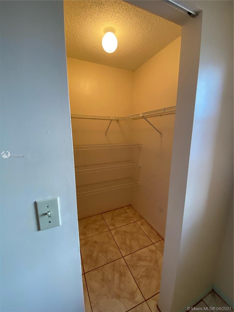 5900 West 18th Avenue, Unit A14 Hialeah, FL 33012 - Photo 24 of 29 a bathroom with a shower