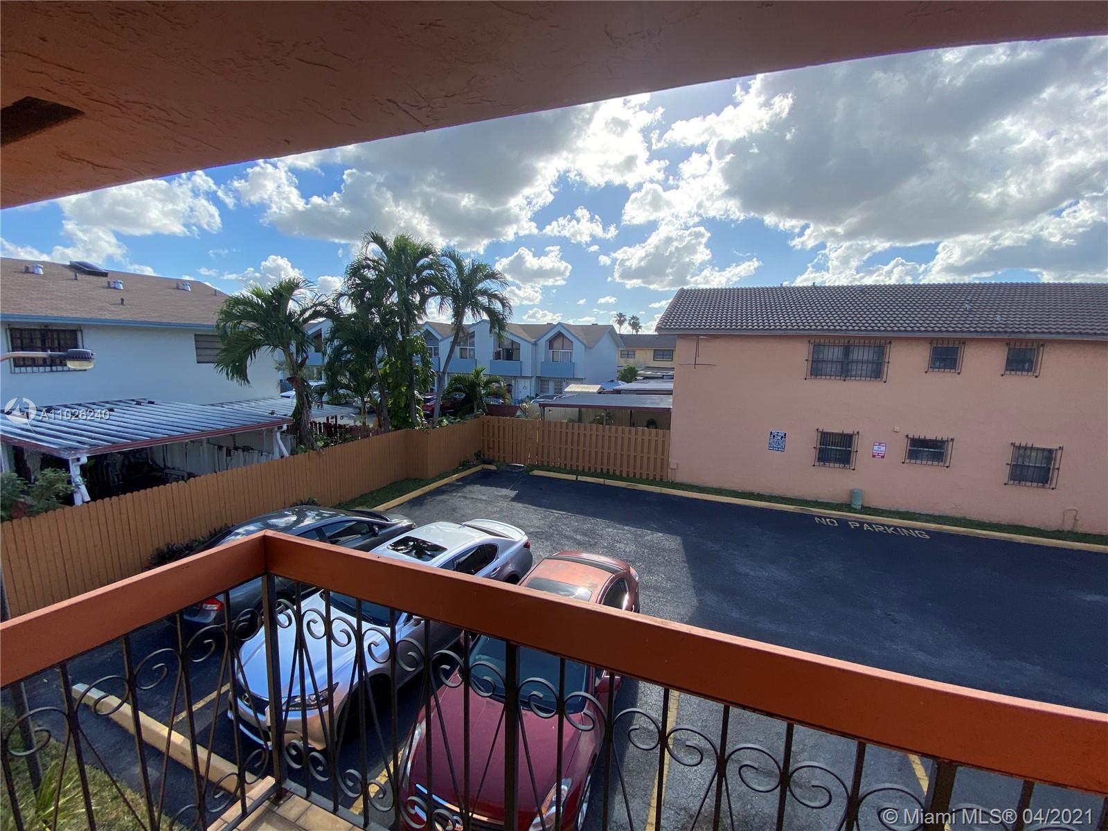 5900 West 18th Avenue, Unit A14 Hialeah, FL 33012 - Photo 4 of 29 a view of a balcony with furniture