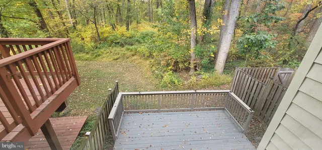 a view of balcony with wooden floor and outdoor space