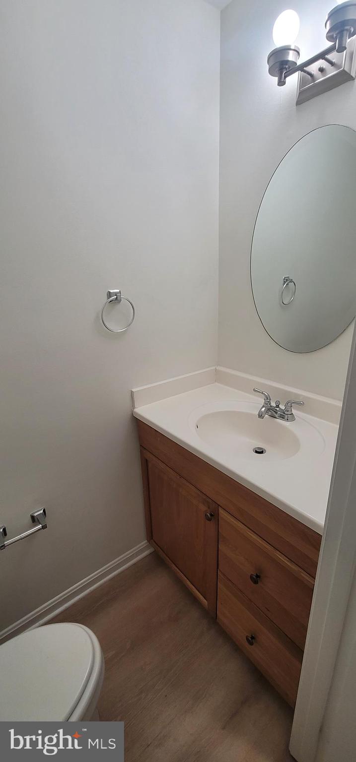 7 Plum Grove Way Gaithersburg, MD 20878 - Photo 14 of 46 a bathroom with a sink and a mirror