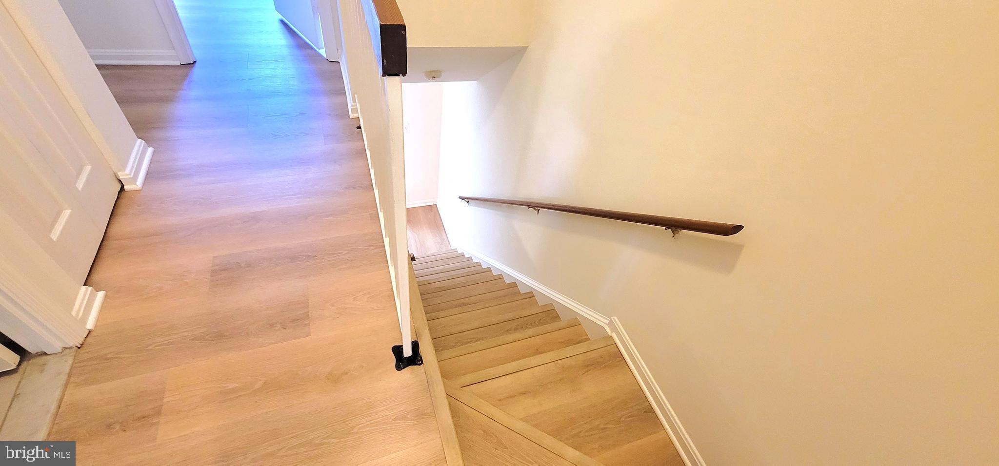 7 Plum Grove Way Gaithersburg, MD 20878 - Photo 15 of 46 a view of a hallway with staircase