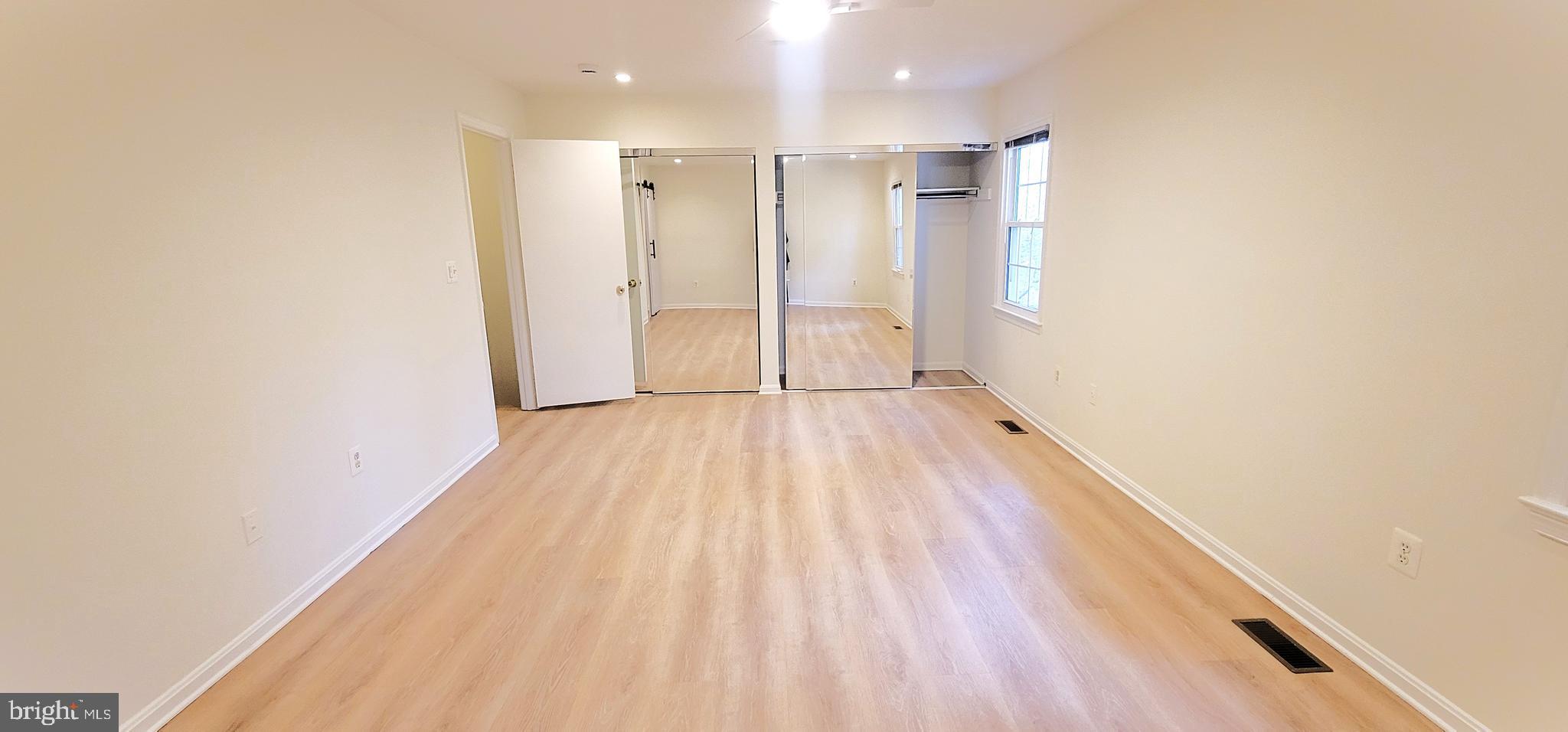 7 Plum Grove Way Gaithersburg, MD 20878 - Photo 18 of 46 a view of wooden floor in an empty room