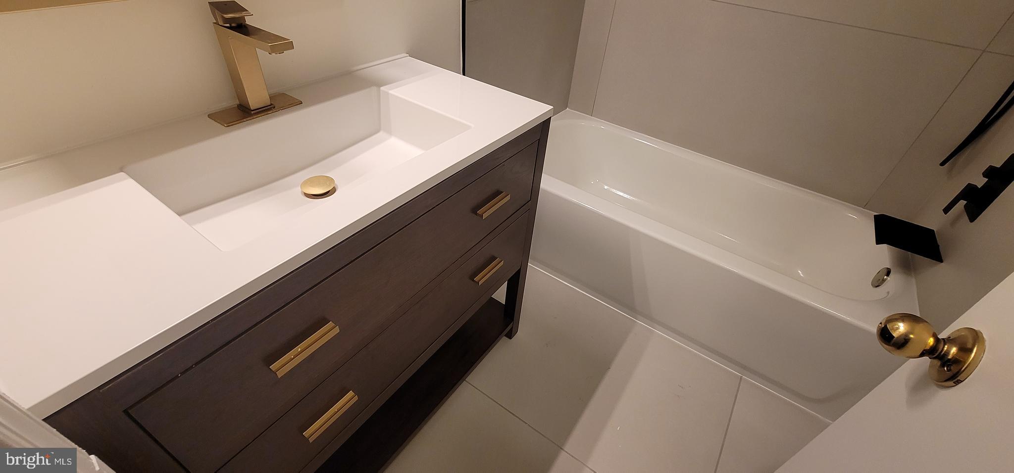 7 Plum Grove Way Gaithersburg, MD 20878 - Photo 31 of 46 a view of water heater room