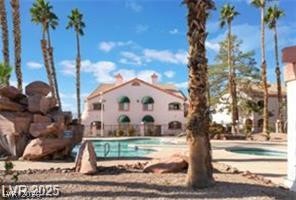 7570 West Flamingo Road, Unit 125 Las Vegas, NV 89147 - Photo 16 of 29 View of community pool