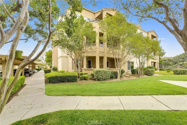 a view of a building with a garden