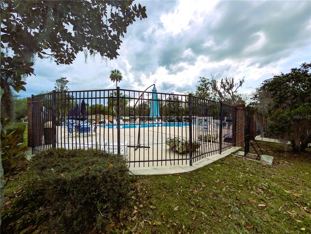 202 Locust Road Ocala, FL 34472 - Photo 8 of 9 a view of a fence