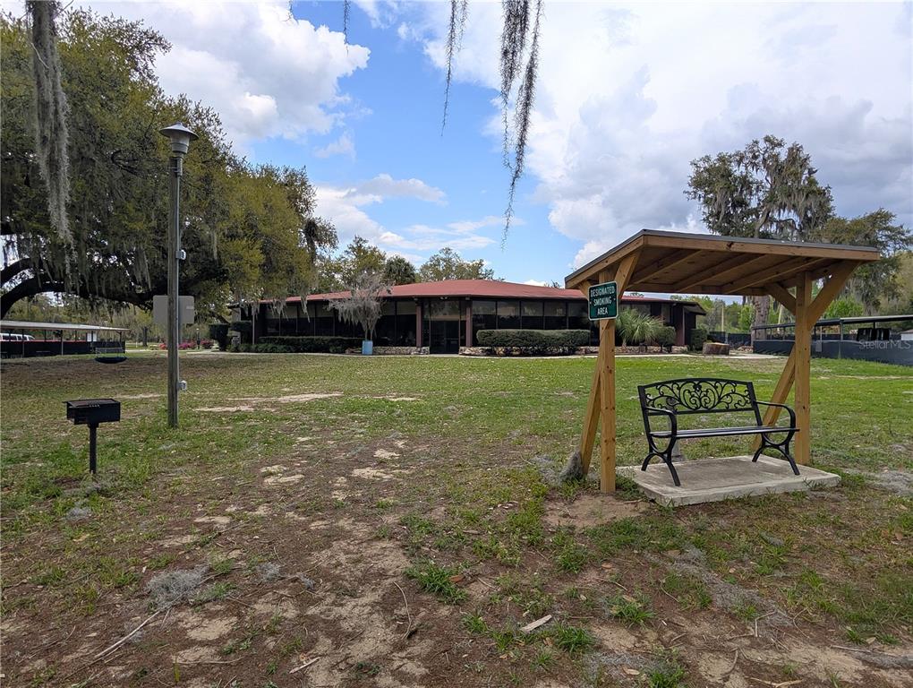 202 Locust Road Ocala, FL 34472 - Photo 9 of 9 a view of a park with a bench