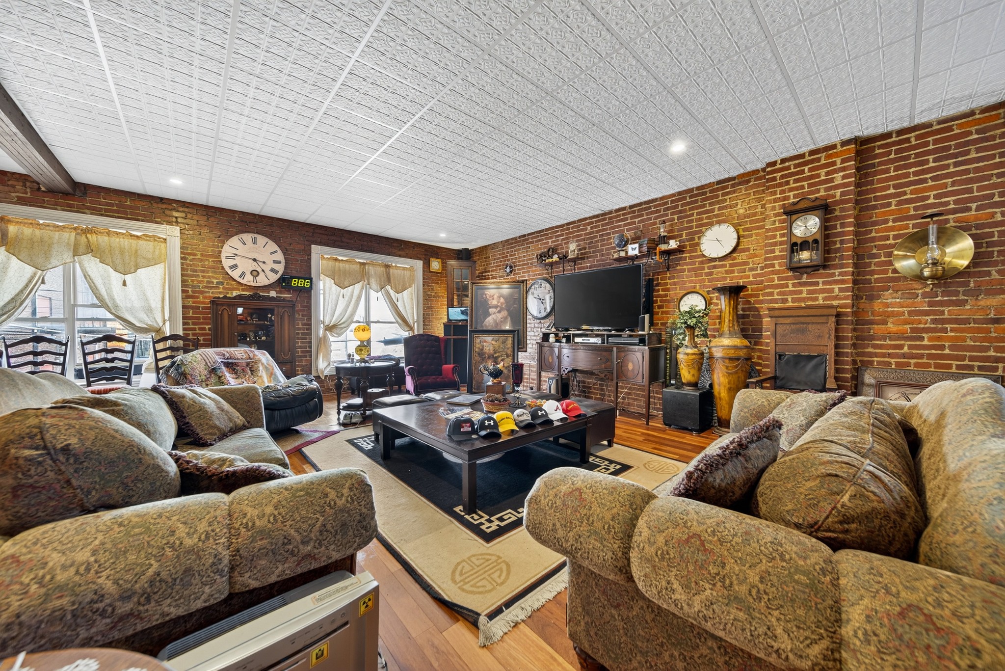 109 East 7th Avenue Springfield, TN 37172 - Photo 31 of 99 a living room with furniture fireplace and a large window