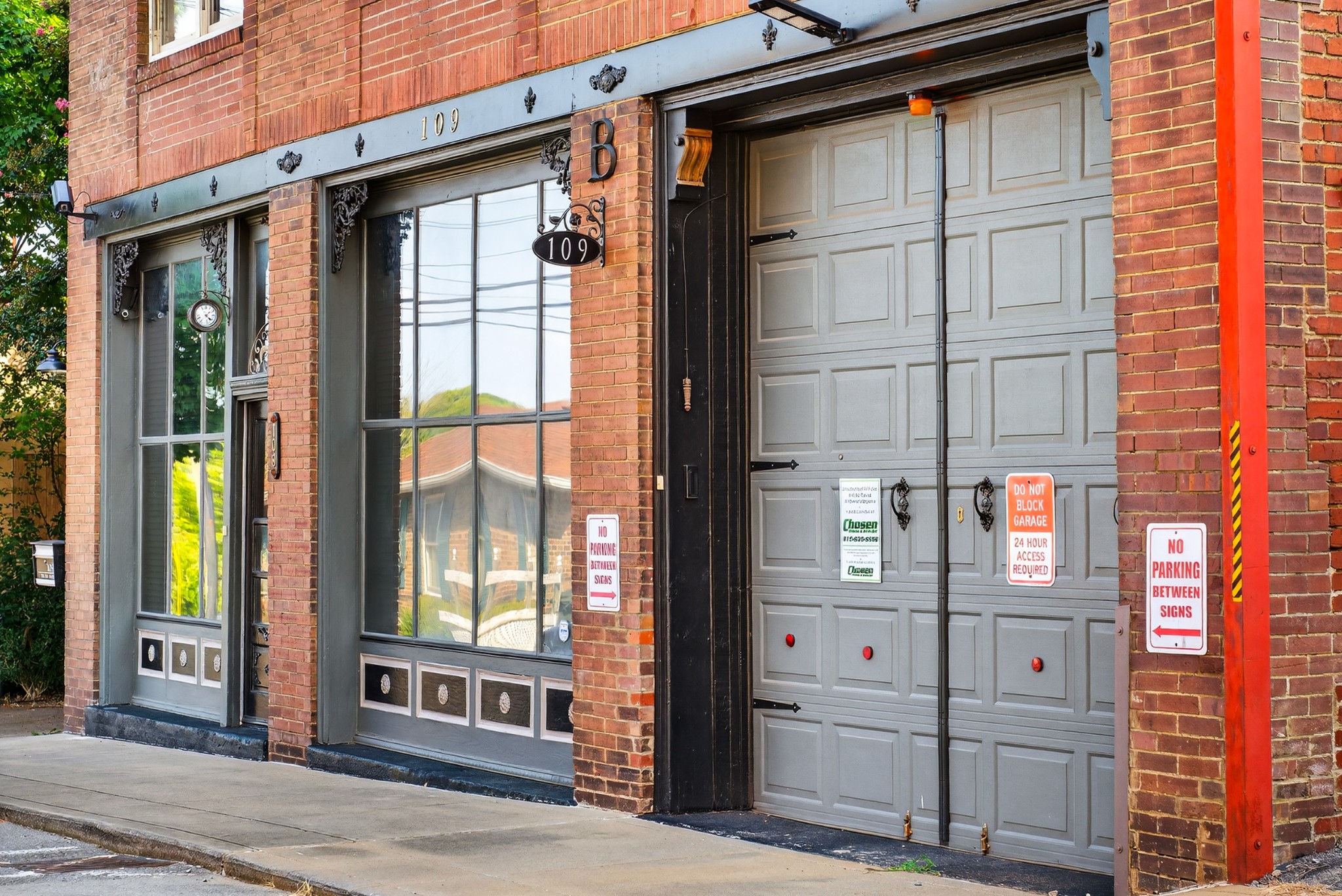 109 East 7th Avenue Springfield, TN 37172 - Photo 10 of 99 a view of a brick house with a windows and refrigerator