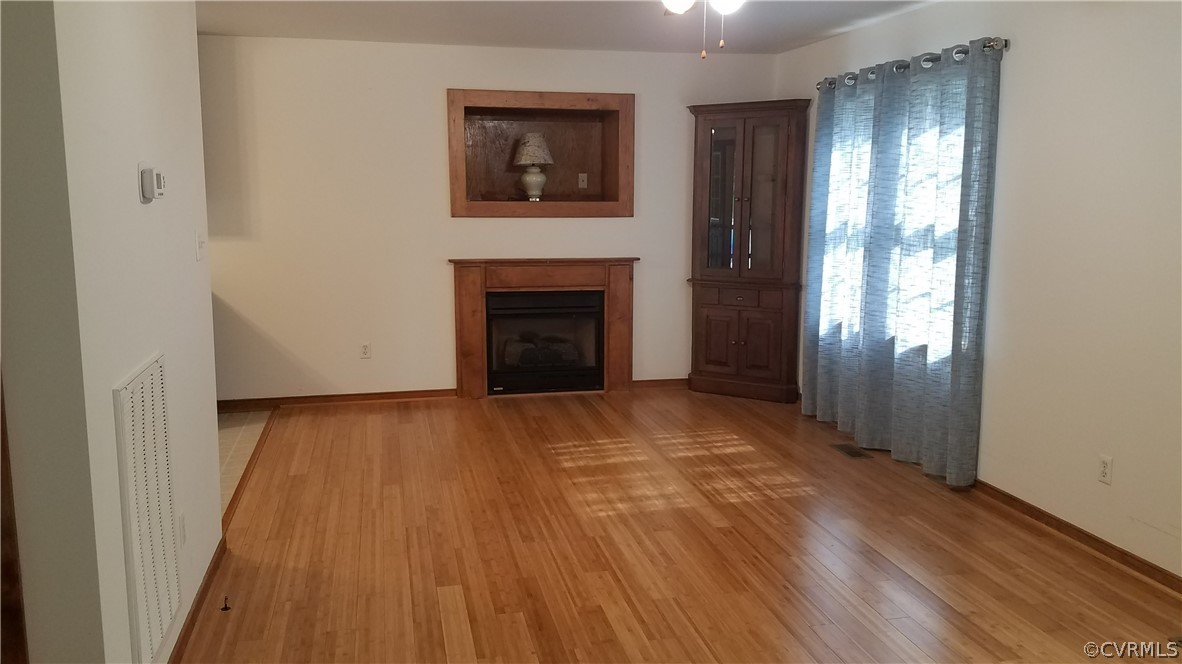 65 Frenchs Store Road Cumberland, VA 23040 - Photo 10 of 12 Living room gas fireplace