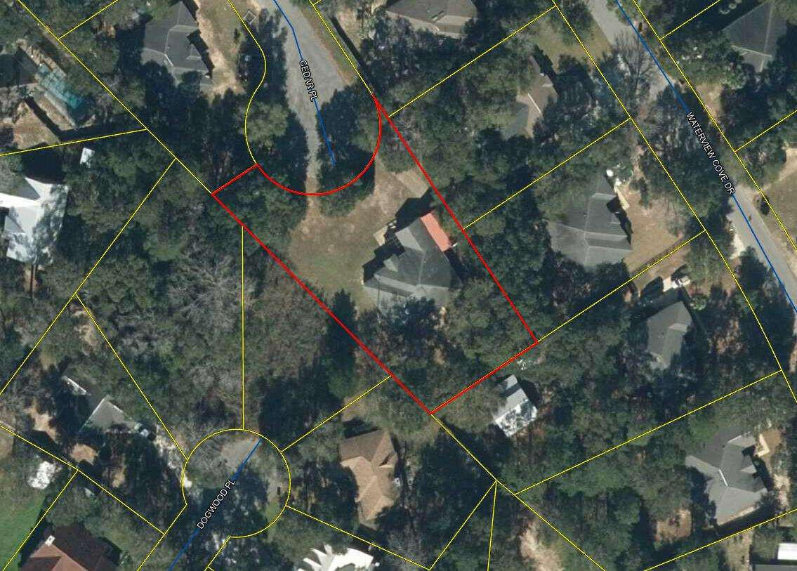 100 Cedar Place Freeport, FL 32439 - Photo 3 of 9 a backyard of a house