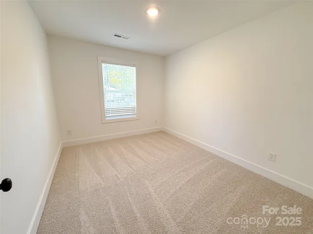 a kitchen with a sink a counter top space and appliances