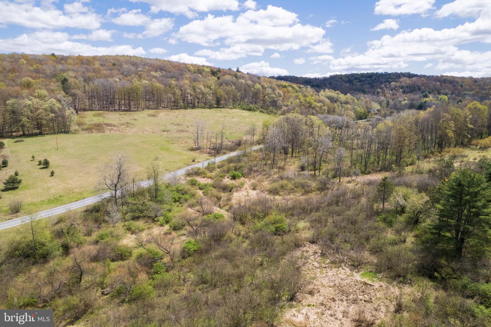 0 Holbrook Road Montrose, PA 18801 - Photo 24 of 147 a view of a lake with mountains in the background