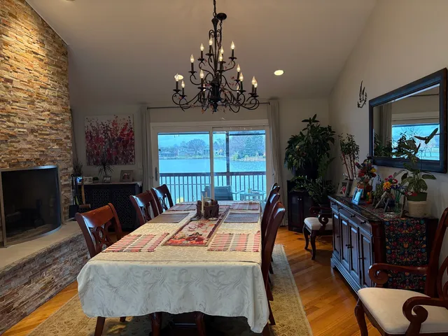 a bed room with furniture and a chandelier