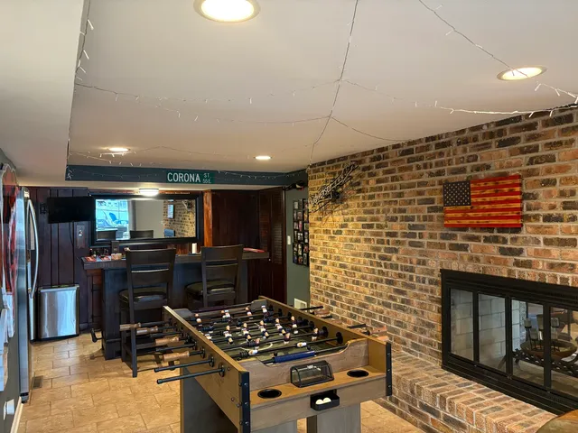 a kitchen with a stove and a refrigerator