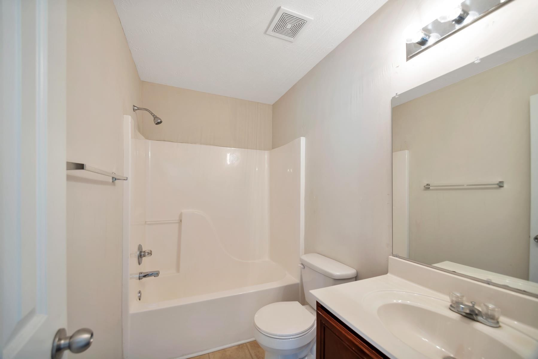 2505 Comanche Way Murfreesboro, TN 37128 - Photo 9 of 21 a bathroom with a sink a toilet and shower