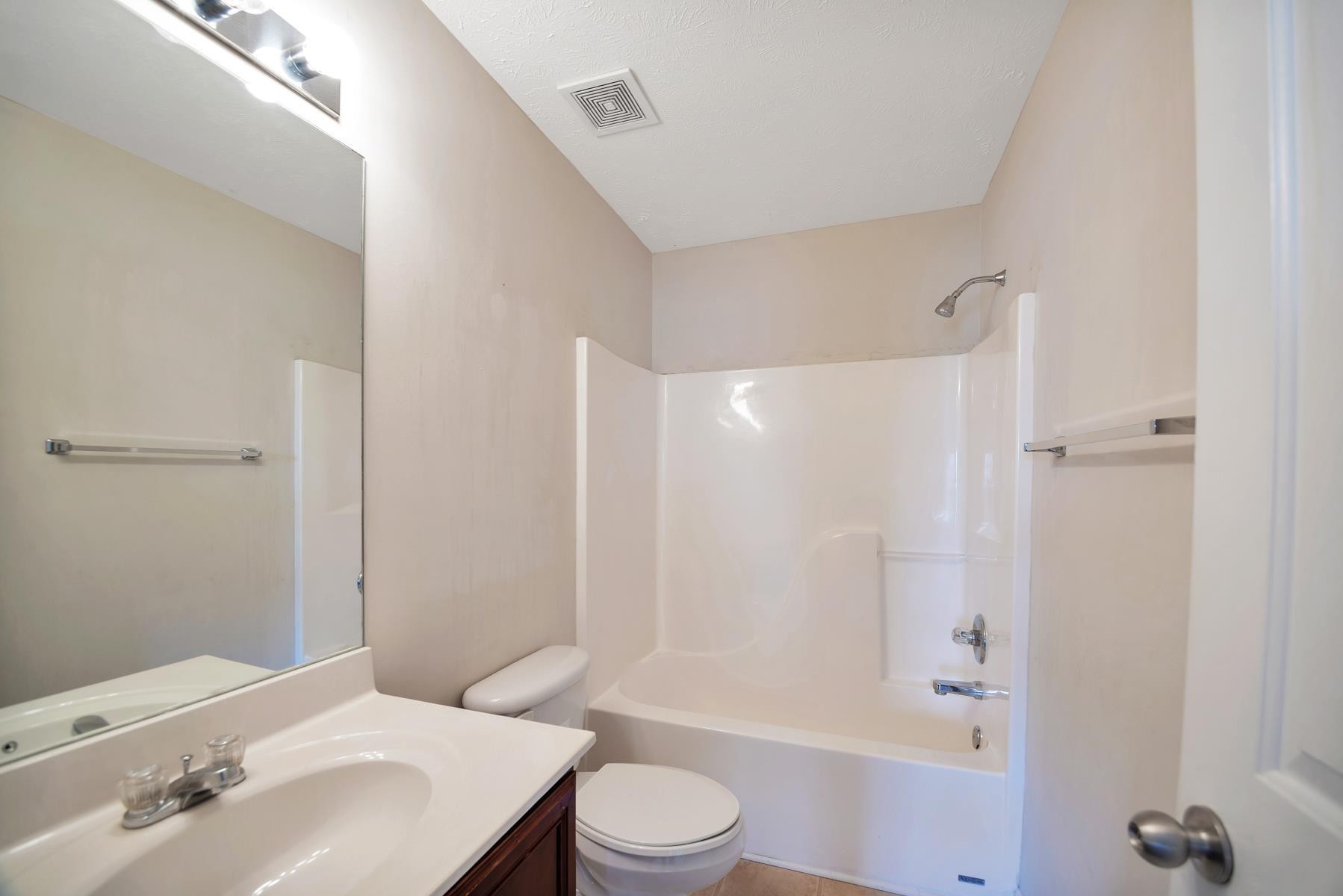 2505 Comanche Way Murfreesboro, TN 37128 - Photo 10 of 21 a bathroom with a sink toilet and shower