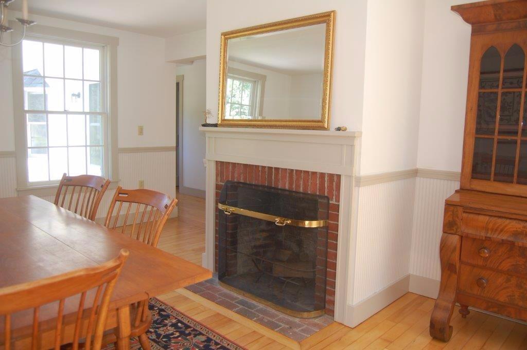 1405 Hallowell Road Litchfield, ME 04350 - Photo 13 of 35 DINING ROOM WITH FIREPLACE