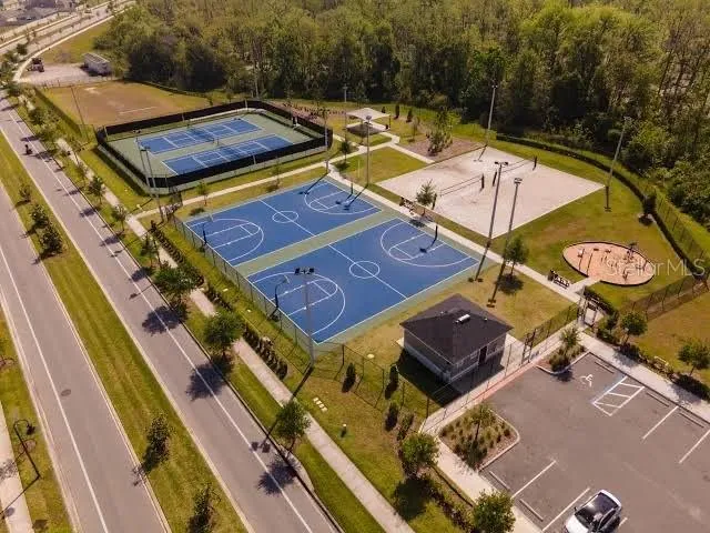 a view of a swimming pool with a lounge chair