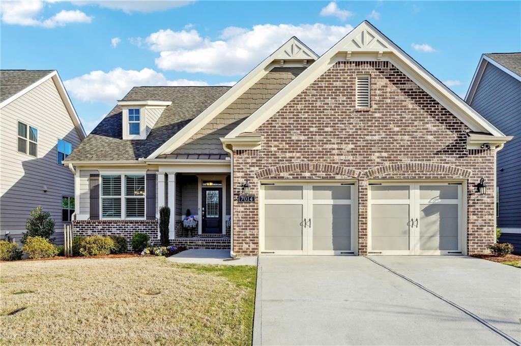 7014 Boathouse Way Flowery Branch, GA 30542 - Photo 1 of 1 front view of a house with a yard