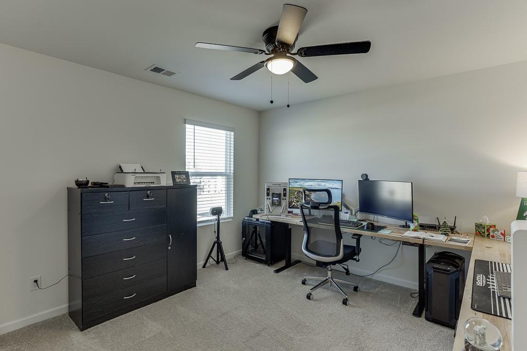 236 Ralph Still Road Dacula, GA 30019 - Photo 23 of 68 a view of a workspace with furniture