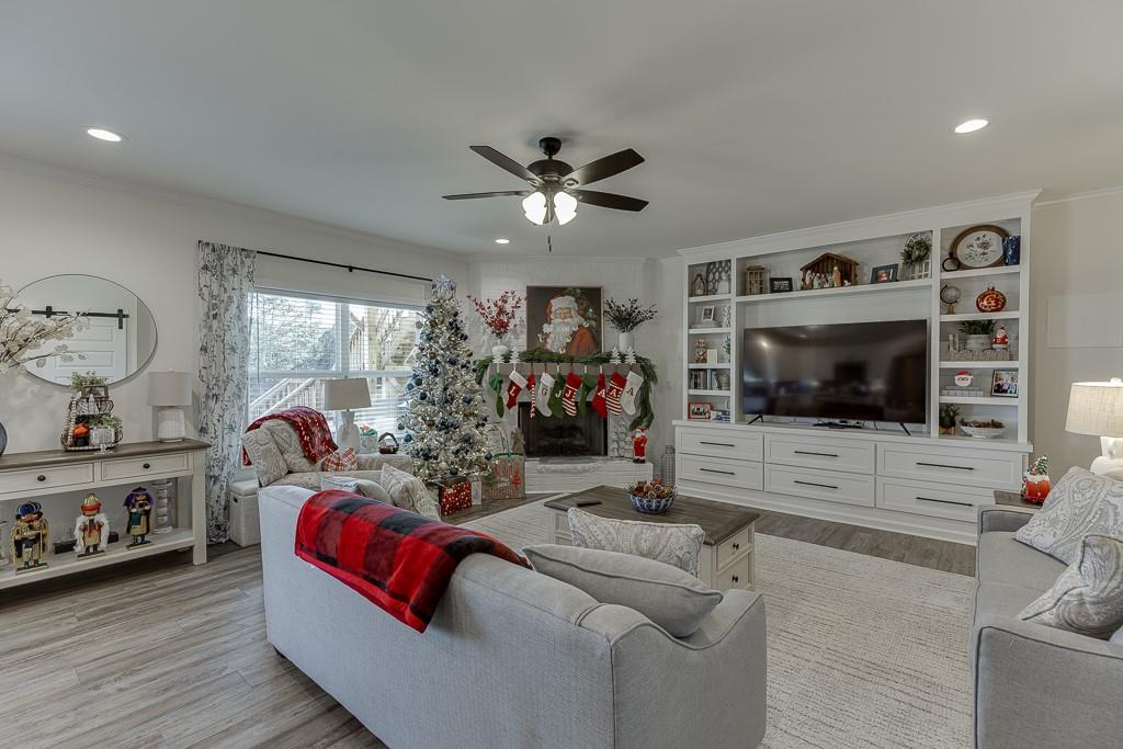 236 Ralph Still Road Dacula, GA 30019 - Photo 42 of 68 a living room with furniture and a flat screen tv