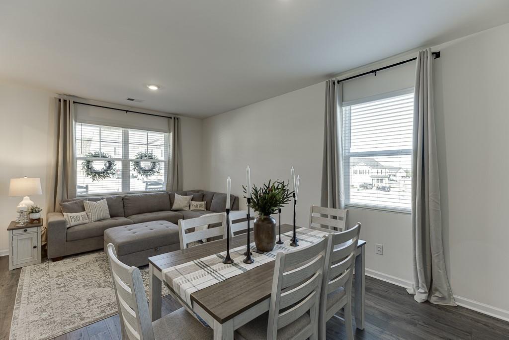 236 Ralph Still Road Dacula, GA 30019 - Photo 6 of 68 a living room with furniture and a large window