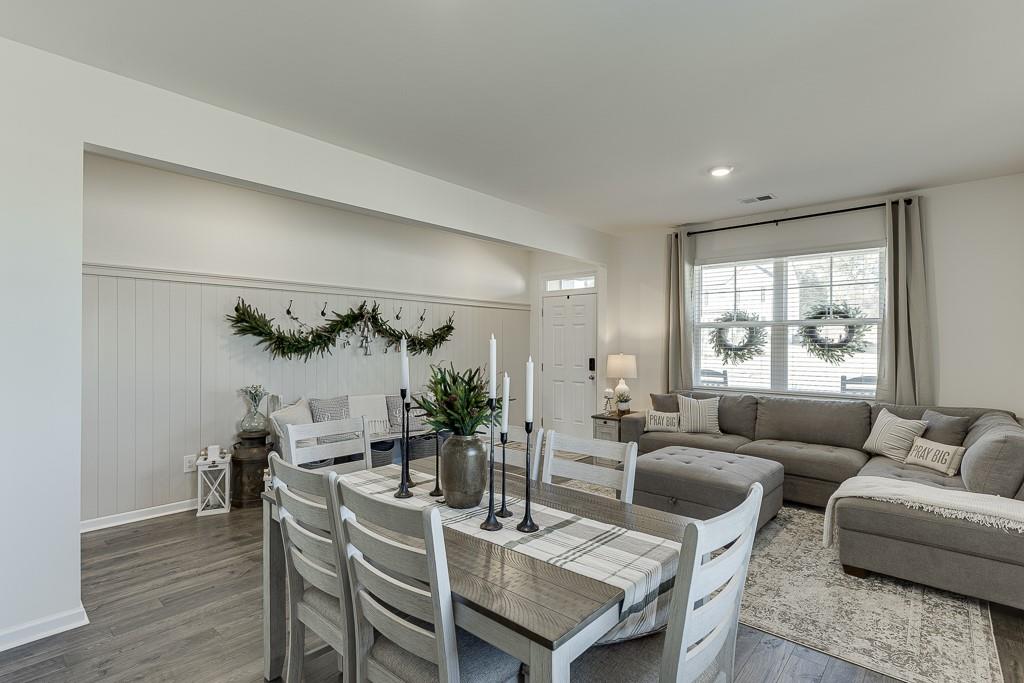 236 Ralph Still Road Dacula, GA 30019 - Photo 7 of 68 a living room with furniture and a large window