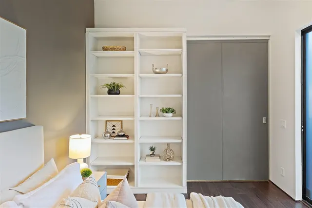 a view of living room with baby furniture and window