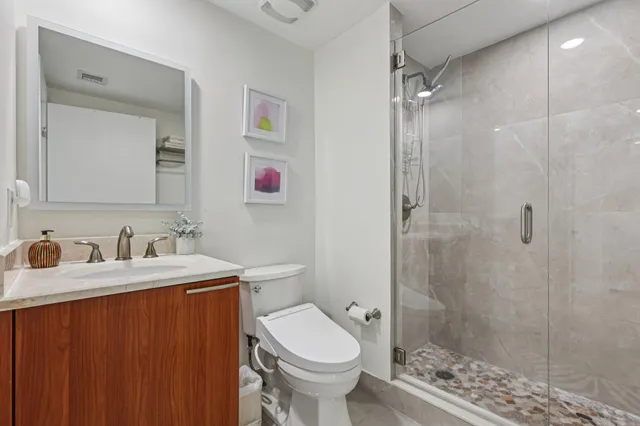 a bedroom with bed and window