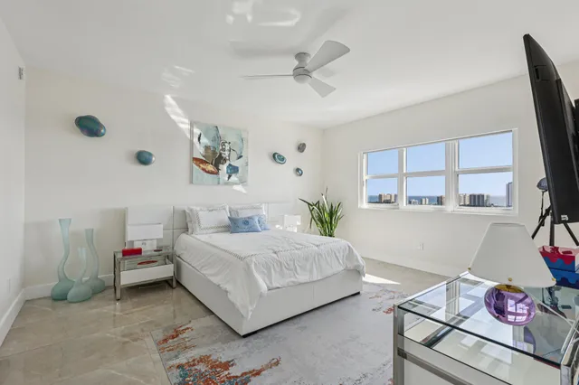 a view of walk in closet with clothes