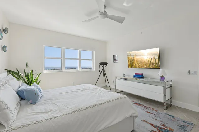 a bathroom with a tub a sink and shower