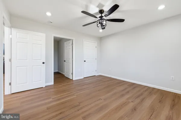 a kitchen with granite countertop a stove and a sink