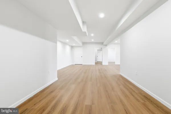 a view of a balcony with wooden floor