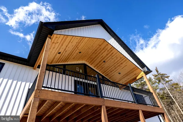 a stove top oven sitting inside of a kitchen