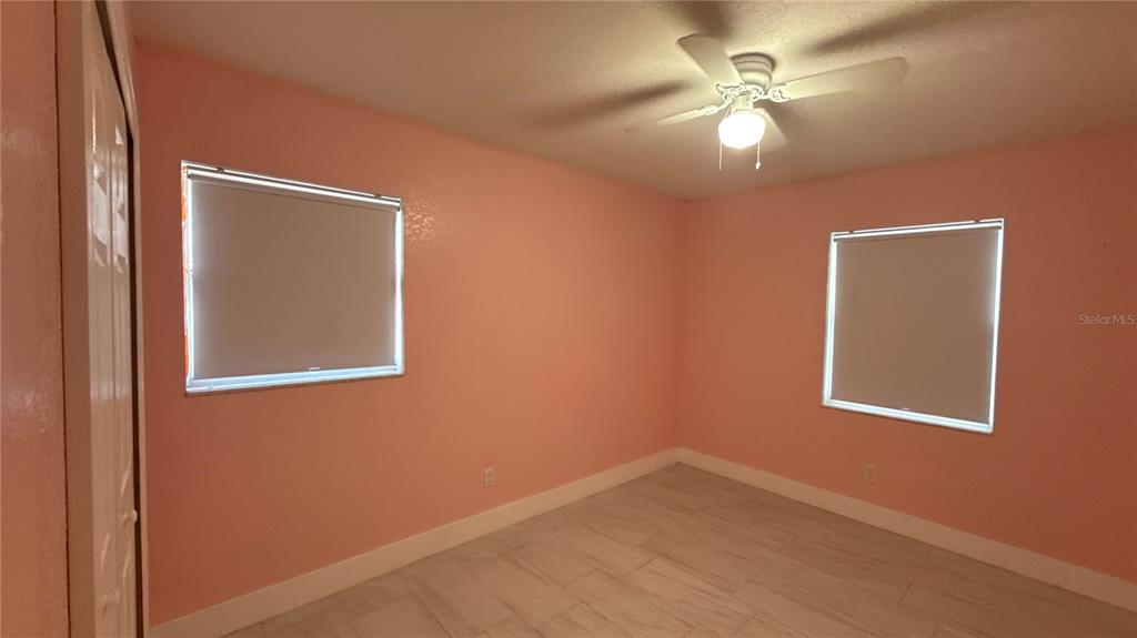 8106 Wichita Way Tampa, FL 33619 - Photo 18 of 21 an empty room with a window