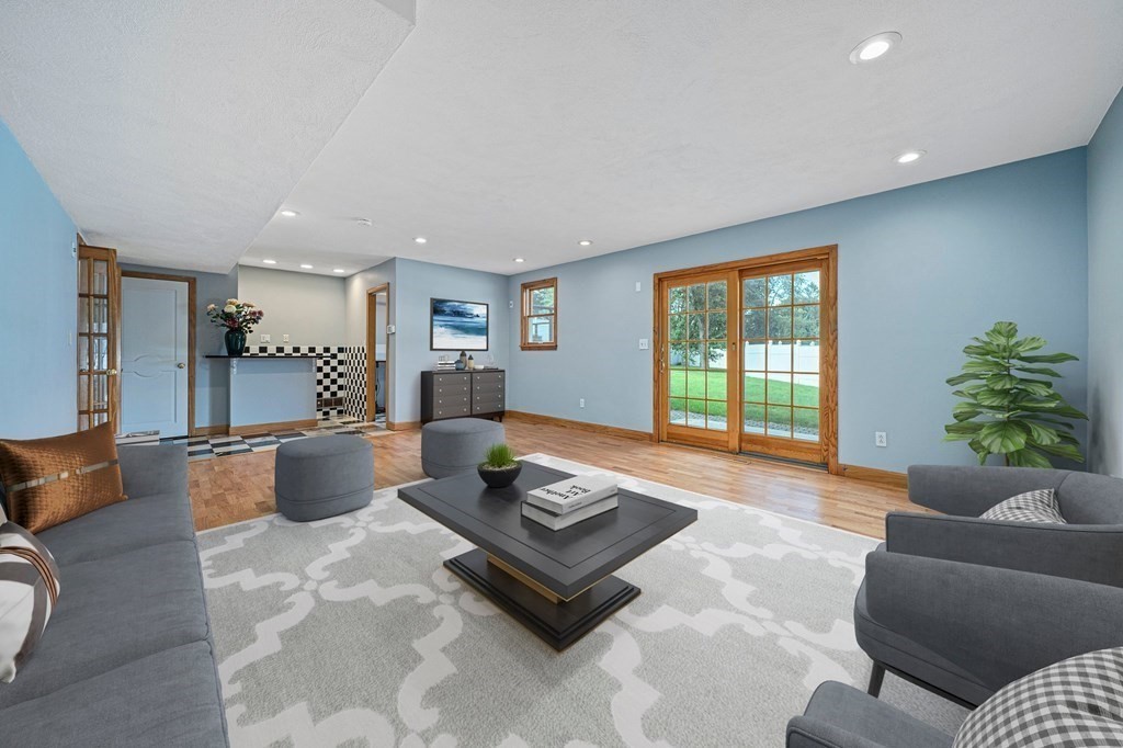 19 Ledge Hill Street Randolph, MA 02368 - Photo 16 of 37 a living room with furniture and a potted plant