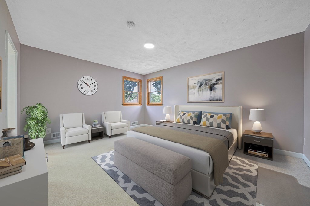 19 Ledge Hill Street Randolph, MA 02368 - Photo 18 of 37 a bedroom with a bed and furniture