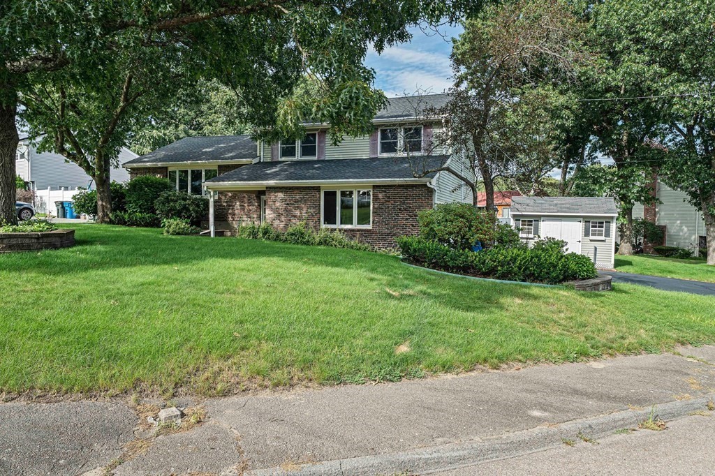 19 Ledge Hill Street Randolph, MA 02368 - Photo 2 of 37 front view of a house and a yard
