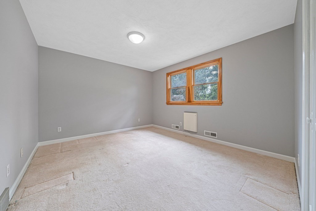 19 Ledge Hill Street Randolph, MA 02368 - Photo 21 of 37 an empty room with a window