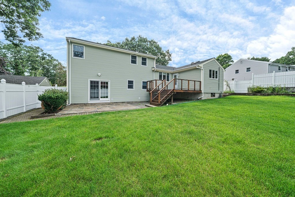 19 Ledge Hill Street Randolph, MA 02368 - Photo 29 of 37 a front view of house with yard and green space