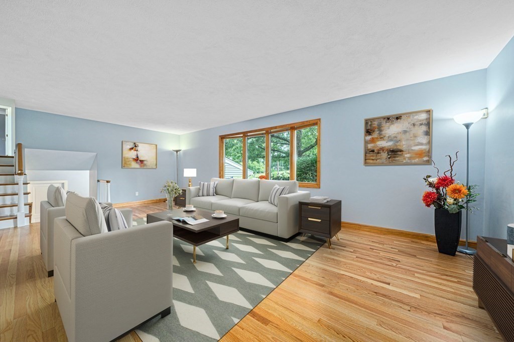 19 Ledge Hill Street Randolph, MA 02368 - Photo 8 of 37 a living room with furniture and a wooden floor