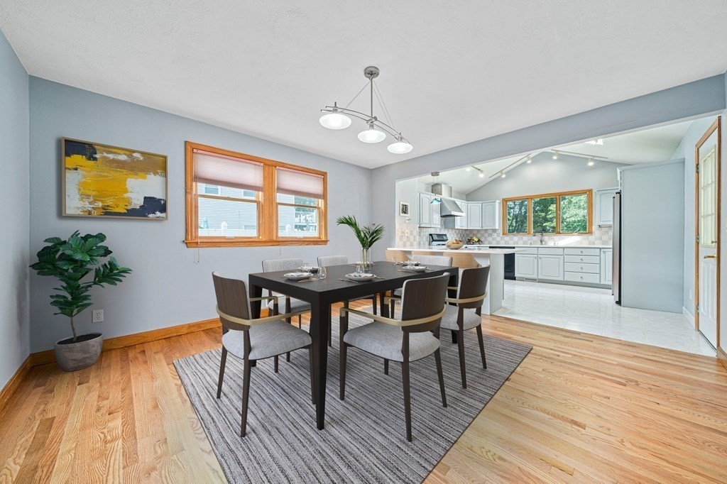 19 Ledge Hill Street Randolph, MA 02368 - Photo 9 of 37 a view of a dining room with furniture and wooden floor
