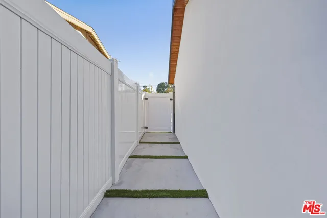 a view of balcony with wooden floor