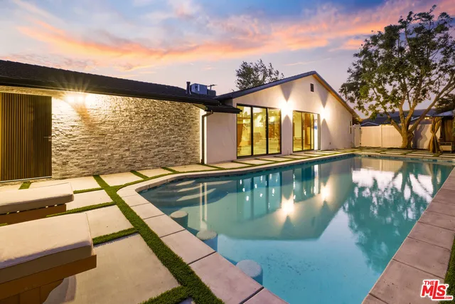 a view of a lake with a house