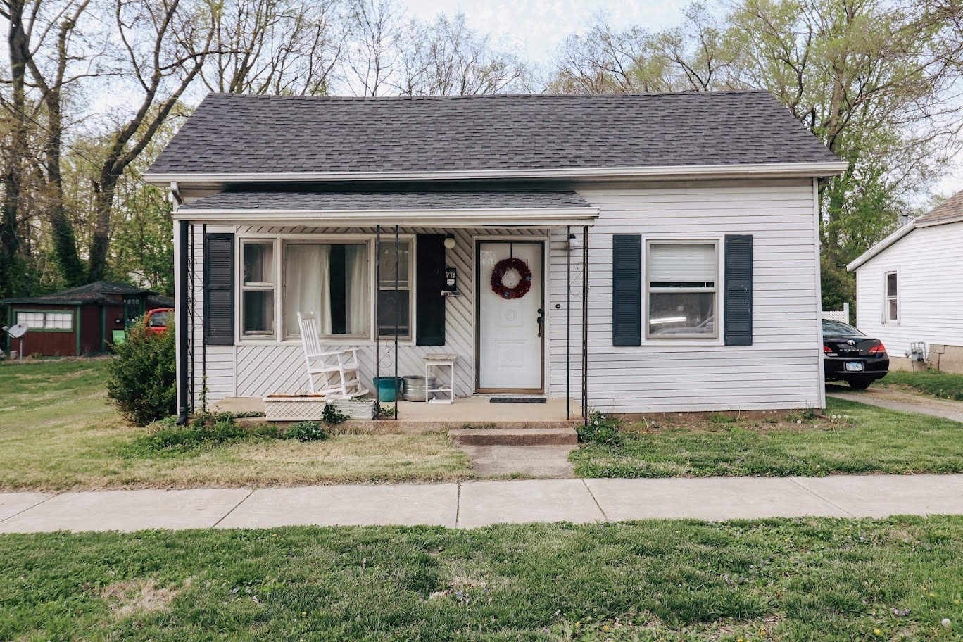 35 Monroe Avenue Charleston, IL 61920 - Photo 1 of 23 a front view of a house with garden