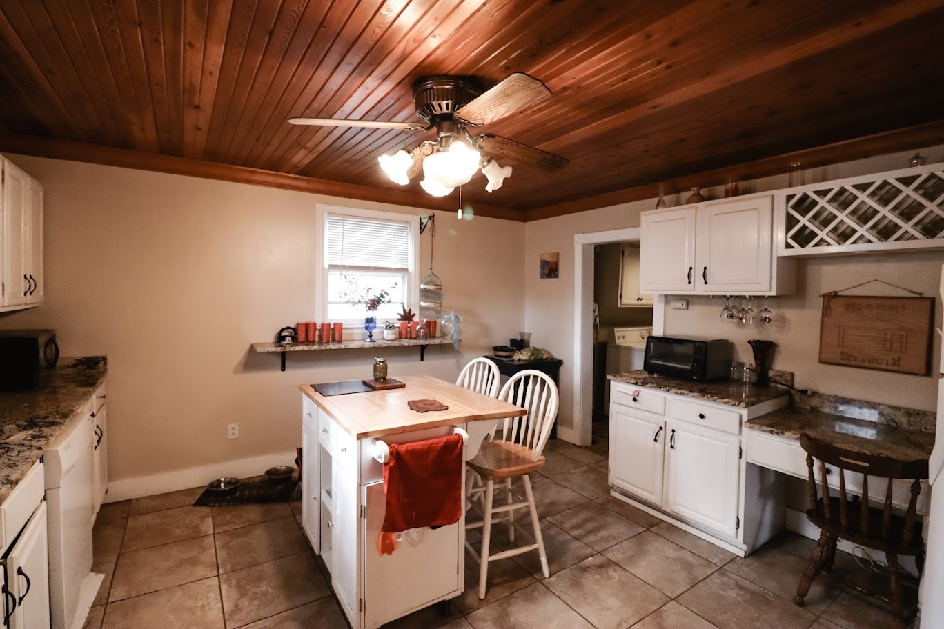 35 Monroe Avenue Charleston, IL 61920 - Photo 12 of 23 a kitchen with granite countertop a sink appliances and cabinets