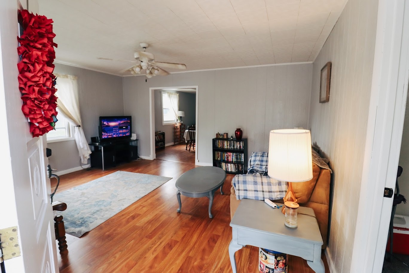 35 Monroe Avenue Charleston, IL 61920 - Photo 3 of 23 a living room with furniture and a wooden floor
