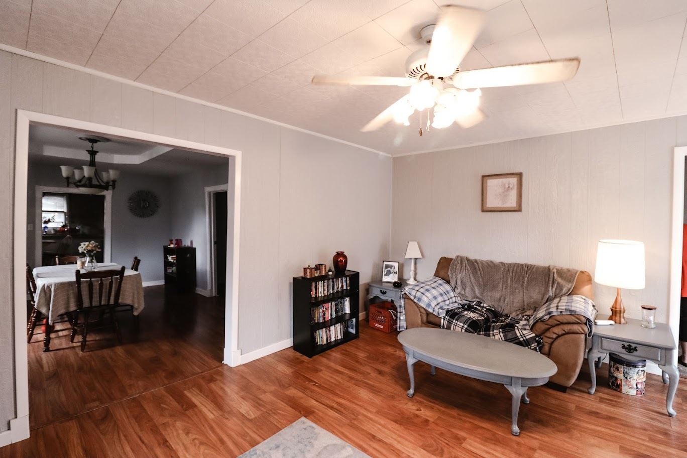35 Monroe Avenue Charleston, IL 61920 - Photo 6 of 23 a living room with furniture and a wooden floor